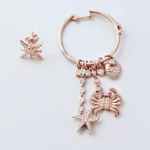 Load image into Gallery viewer, Hoop With Dangling Rose Crab and Star Earrings